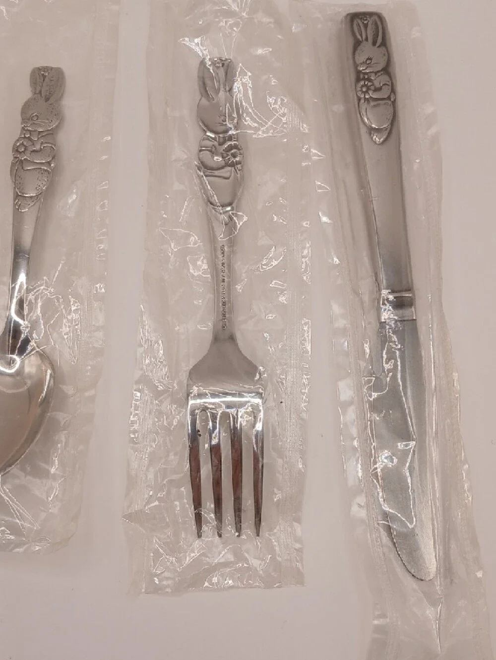 Oneida Peter Rabbit Child's Vtg Stainless Flatware Set of 4 (3 new, 1 used)